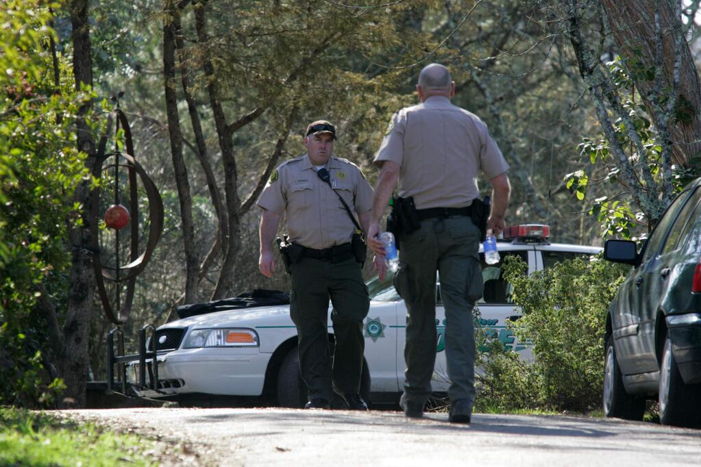Sonoma County sheriff's deputies at the scene of a triple homicide in Forestville. (PD FILE, 2013)