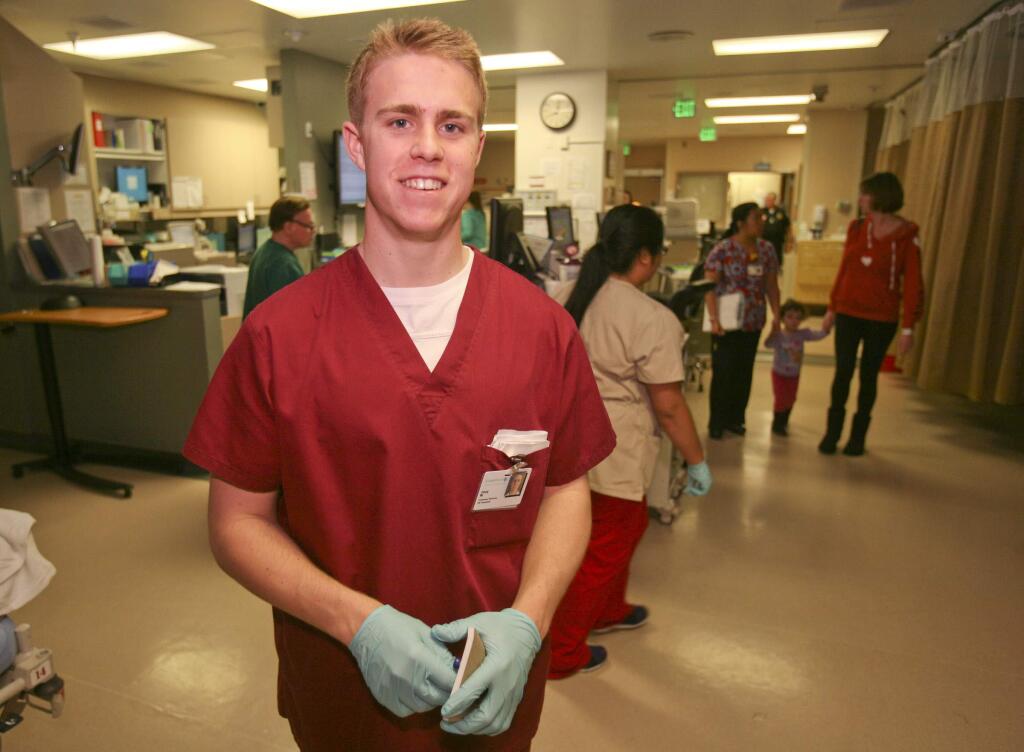 SCOTT MANCHESTER/ARGUS-COURIER STAFFSt, Vincent de Paul High School High School senior Joey Wertz is taking the first step toward becoming a doctor by volunteering in the ER at Petaluma Valley Hospital.