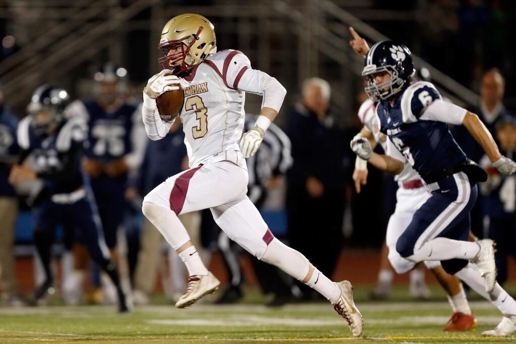 Cardinal Newman's Mark Boschetti (3) runs in for a touchdown on the game's opening kickoff during the first half of the NCS Division 3 varsity football championship game between Cardinal Newman and Marin Catholic high schools in Rohnert Park, California on Saturday, December 2, 2017. (Alvin Jornada / The Press Democrat)