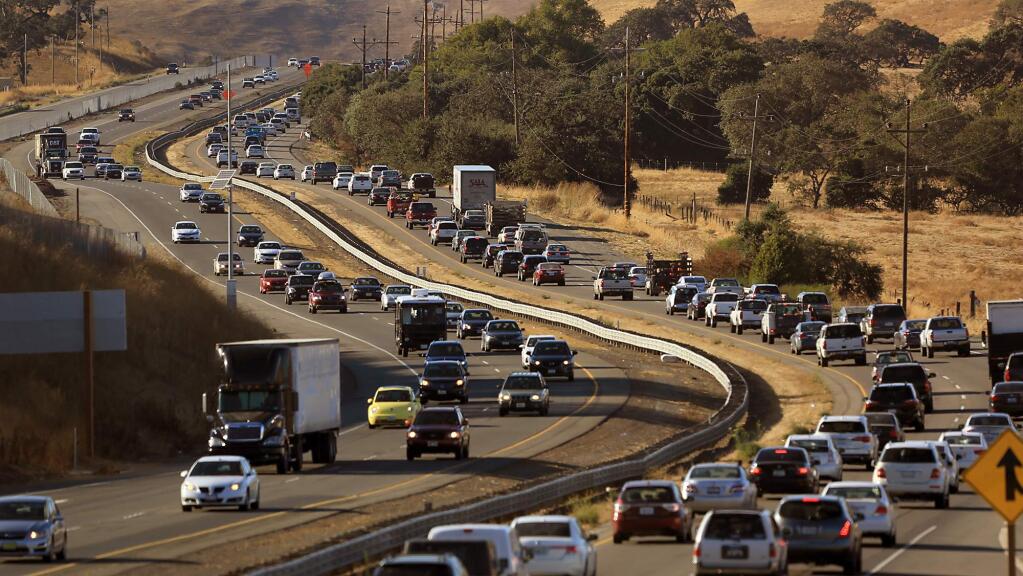 Traffic begins to bottleneck in the Sonoma-Marin Narrows as commuters head north to Sonoma County near Petaluma. (Kent Porter / Press Democrat, 2016)