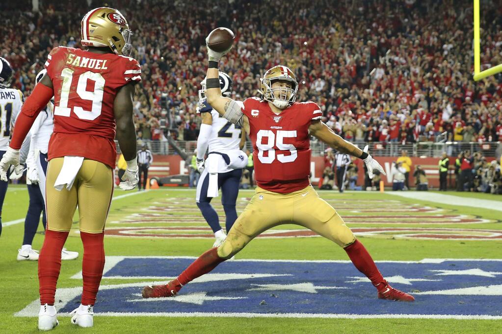 San Francisco 49ers tight end George Kittle celebrates after scoring against the Los Angeles Rams during the second half in Santa Clara, Saturday, Dec. 21, 2019. (AP Photo/John Hefti)