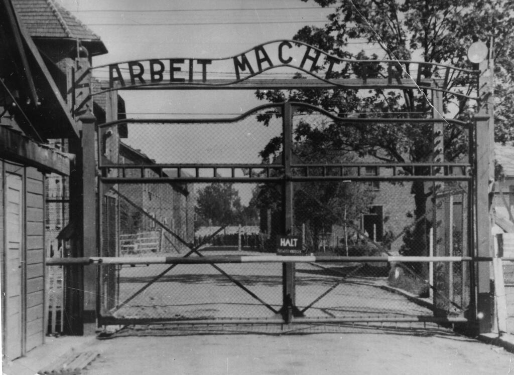 This undated file image shows the main gate of the Nazi concentration camp Auschwitz I, Poland, which was liberated by the Russians in January 1945. (AP Photo/File)