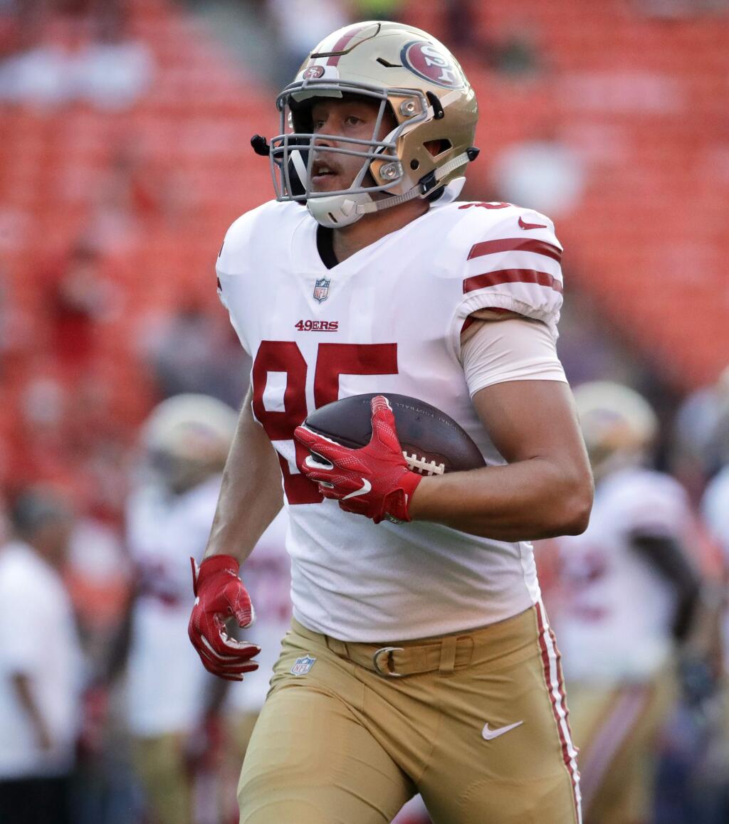 San Francisco 49ers tight end George Kittle carries the ball before a preseason game against the Kansas City Chiefs in Kansas City, Mo., Friday, Aug. 11, 2017. (AP Photo/Charlie Riedel)