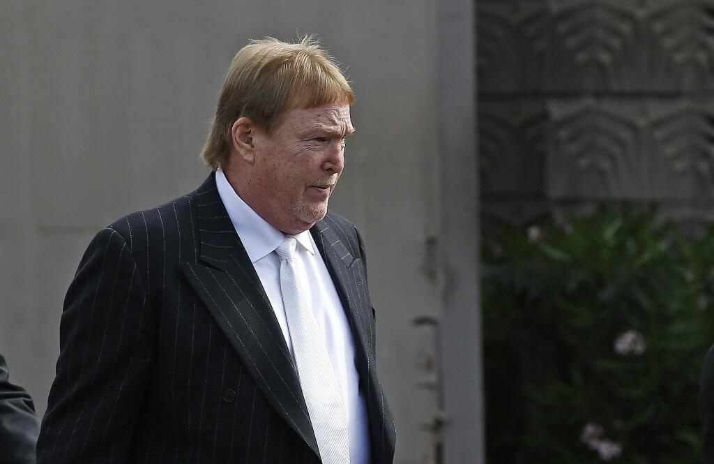 Oakland Raiders owner Mark Davis arrives for a morning meeting of owners at the NFL football annual meetings Monday, March 27, 2017, in Phoenix. The owners are expected to take up the issue of the Raiders moving from Oakland to Las Vegas. (AP Photo/Ross D. Franklin)