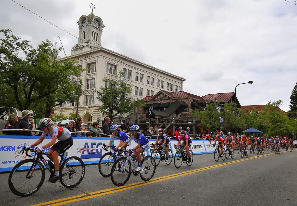 Riders in the Amgen Tour of California Women's Race ride past Old Courthouse Square, along Fourth Street, in Santa Rosa on Saturday, May 21, 2016. (Christopher Chung/ The Press Democrat)