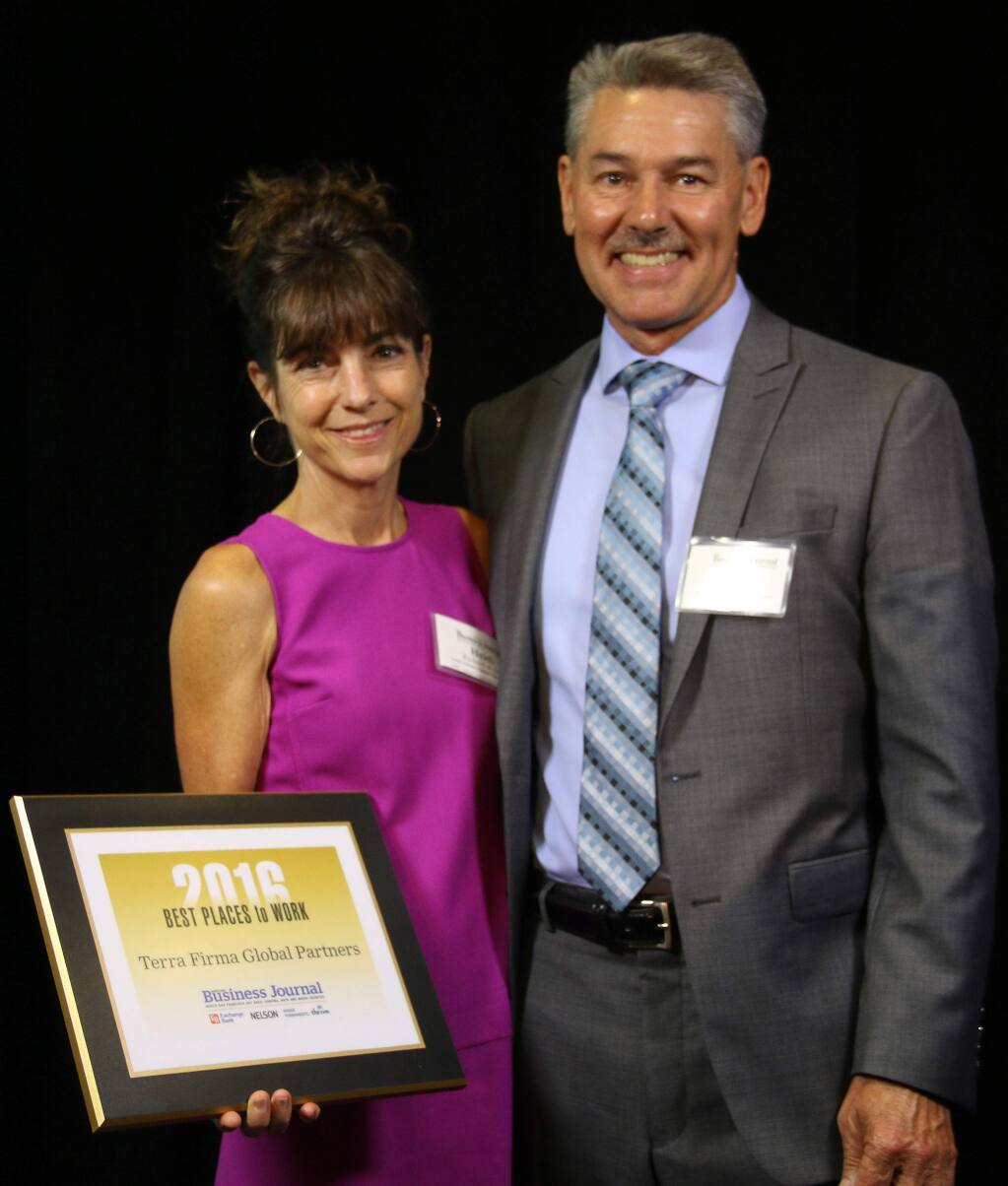 Heidi Rickerd Rizzo and Bill Facendini of Terra Firma Global Partners receives one of North Bay Business Journal's Best Places to Work awards at Hyatt Vineyard Creek Hotel & Spa on Sept. 29, 2016. (JEFF QUACKENBUSH / NORTH BAY BUSINESS JOURNAL)