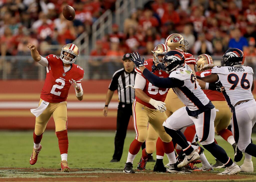 49ers quarterback Brian Hoyer fumbles the football on a throw on a third and 12 during the first quarter at Levi's Stadium against the Denver Broncos, Saturday August 19, 2017. Denver recovered the ball. (Kent Porter / The Press Democrat)