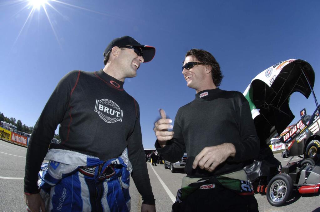 The late Eric Medlen gives thumbs up to Ron Capps in 2006 at Sonoma Raceway. Medlen died in an accident less than a year later, and Capps will receive an award in his honor at Nitro Night, July 26 at Viansa Winery. (Auto Imagery)