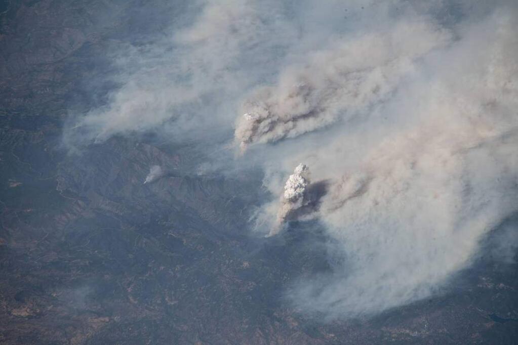 This image, taken from the International Space Station, shows both the Ferguson and Carr fires burning through the hillside in California. Both fires have devastated the area, leaving a combined 250,000 acres scorched and many without homes. (Photo courtesy of Alexander Gerst / NASA)