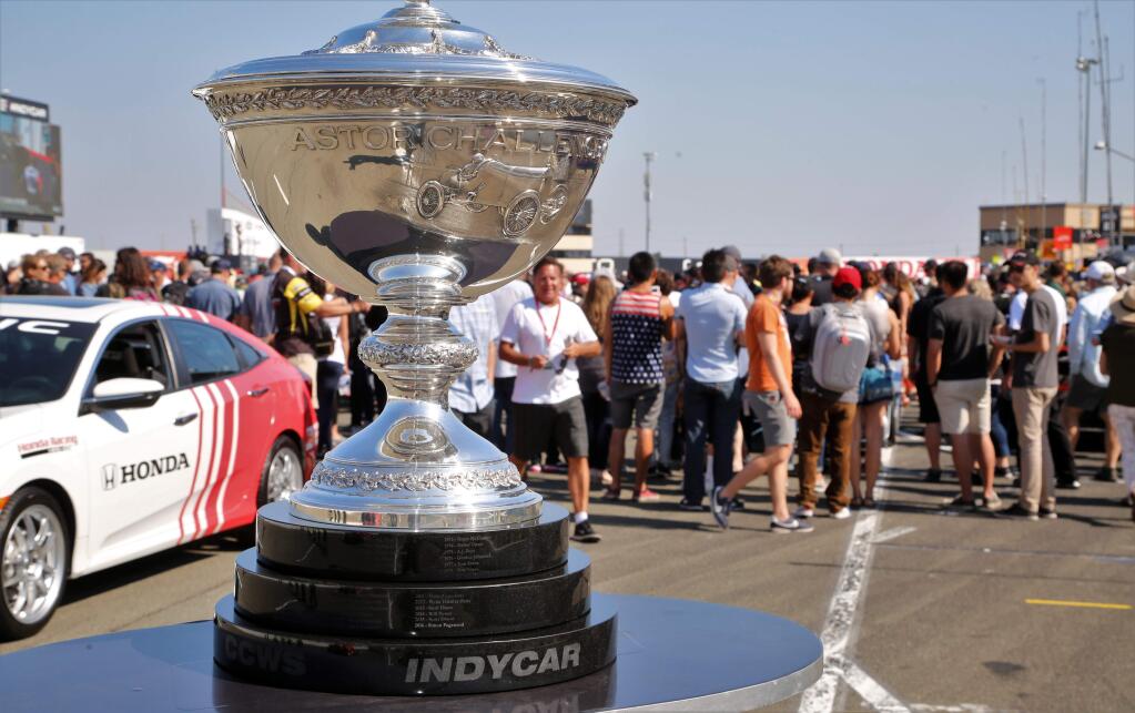 The IndyCar Championship Trophy on display in the pit lane at last year's IndyCar season finale at Sonoma Raceway. This year's finale is on Sunday, Sept. 16. (Will Bucquoy for the Press Democrat).