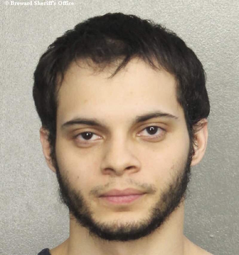 This booking photo provided by the Broward Sheriff's Office shows suspect Esteban Ruiz Santiago, 26, Saturday, Jan. 7, 2017, in Fort Lauderdale, Fla. Relatives of the man who police say opened fire Friday killing several people and wounding others at a Florida airport report he had a history of mental health issues. They tell The Associated Press and other news outlets that some of the problems followed his time serving a military tour in Iraq, and that he was being treated at his current home in Alaska. (Broward Sheriff's Office via AP)