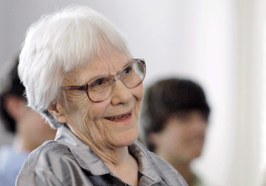 FILE - In this Aug. 20, 2007, file photo, 'To Kill A Mockingbird' author Harper Lee smiles during a ceremony honoring the four new members of the Alabama Academy of Honor, at the state Capitol in Montgomery, Ala. An illustrated edition of Lee's beloved novel will be published in November 2018, HarperCollins announced Tuesday, June 6, 2017. (AP Photo/Rob Carr, File)