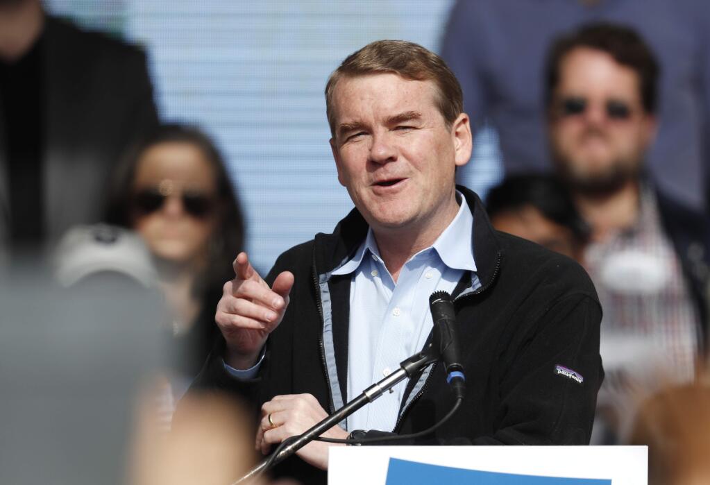 FILE - In this Oct. 24, 2018, file photo, U.S. Senator Michael Bennet, D-Colo., speaks before Senator Bernie Sanders during a rally with young voters on the campus of the University of Colorado in Boulder, Colo. Bennet says he is seeking the Democratic nomination for president in 2020. The three-term senator made the announcement Thursday on “CBS This Morning.” He is now among more than 20 Democrats seeking the party's presidential nomination. (AP Photo/David Zalubowski, File)