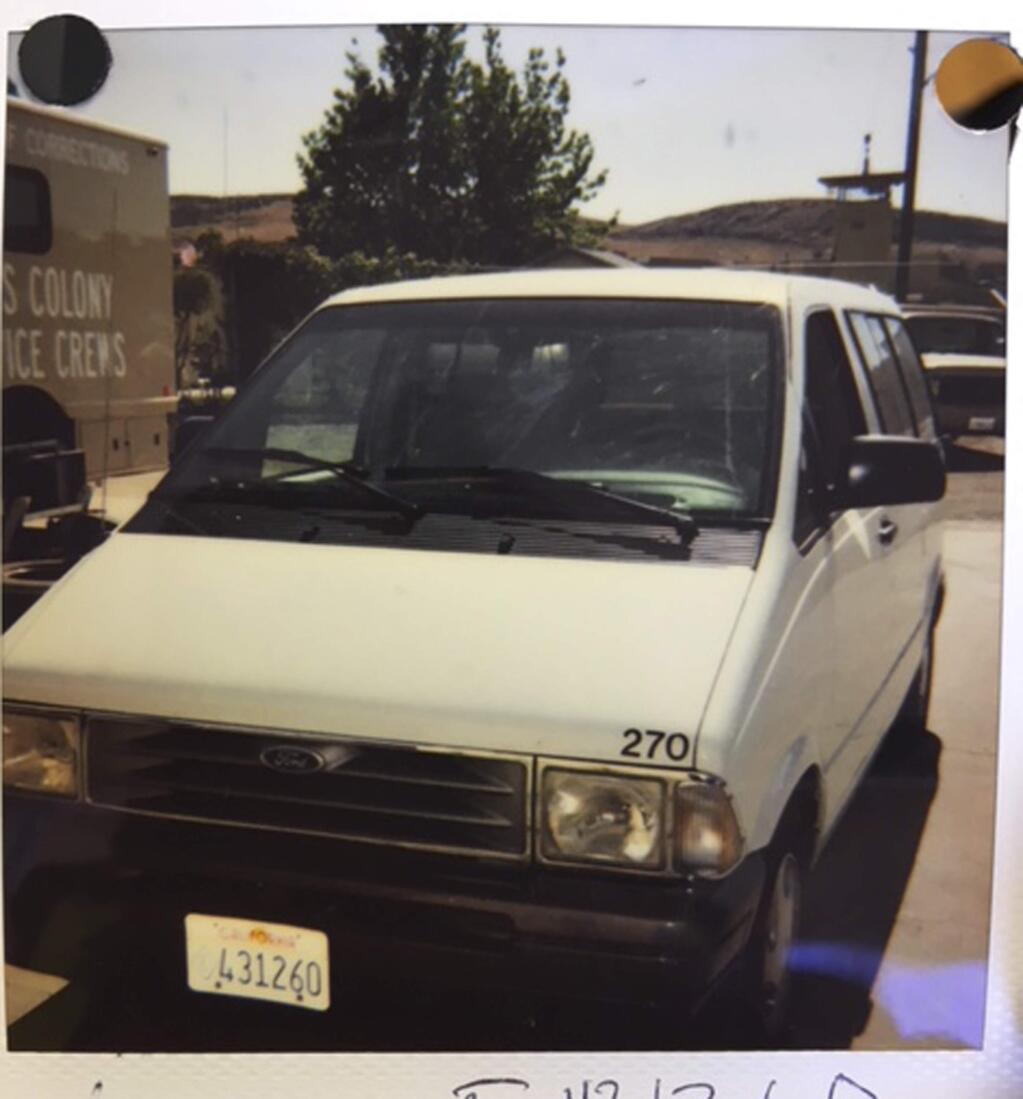 FILE - In this undated photo provided by the California Department of Corrections and Rehabilitation is a white 1997 Ford Aerostar van that officials say was used by inmate David Gray Hill to escape, last month from the California Men's Colony prison in San Luis Obispo, Calif. Authorities say they apprehended Hall, Friday, Nov. 16, 2018, about 200 miles away, in a park in the Southwest area of Los Angeles. The van was found nearby. (California Department of Corrections and Rehabilitation via AP)