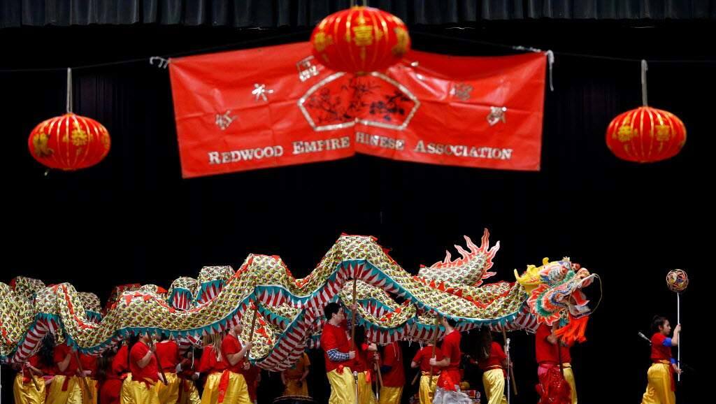 Dragon dancers coil around the stage during the Chinese New Year celebration presented by the Redwood Empire Chinese Association at Veterans Memorial Hall in Santa Rosa. (Alvin Jornado/Press Democrat.)