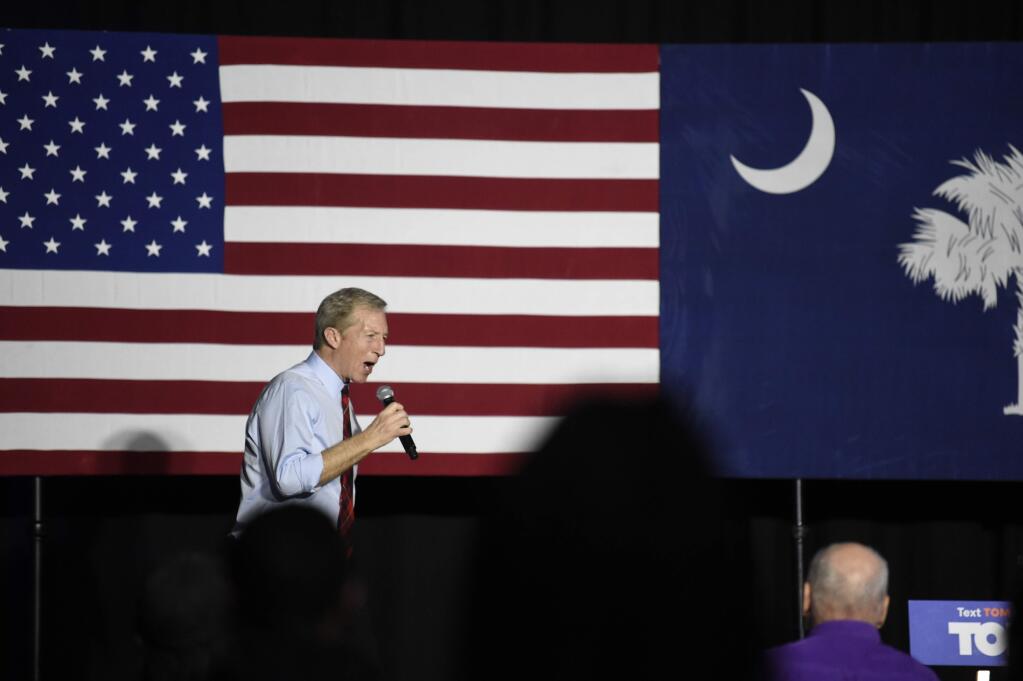 Democrat Tom Steyer addresses the crowd at his election-eve rally the night before the South Carolina presidential primary on Friday, Feb. 28, 2020, in Columbia, S.C. (AP Photo/Meg Kinnard)