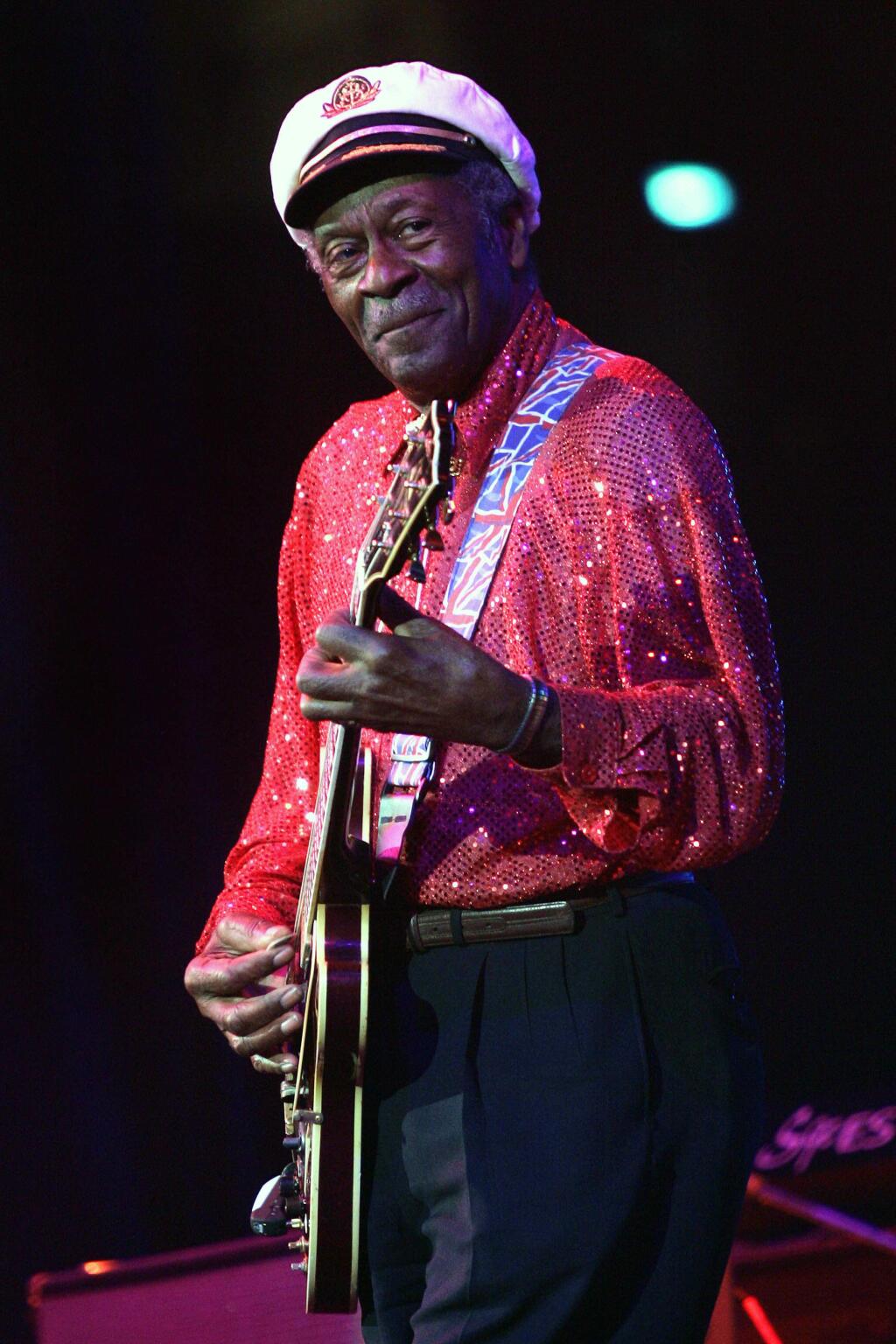 FILE - In this Saturday, May 30, 2009 file photo, Chuck Berry performs at The Domino Effect, a tribute concert to New Orleans rock and roll musician Fats Domino, at the New Orleans Arena in New Orleans. On Saturday, March 18, 2017, police in Missouri said Berry has died at the age of 90. (AP Photo/Patrick Semansky)