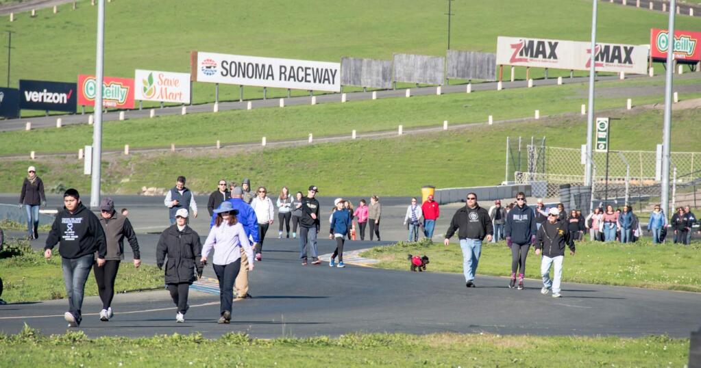 Mike Finnegan/Special to the Index-TribuneMore than 400 walkers raised more than $22,000 to fight stomach cancer on Jan. 20, as part of John's March Against Stomach Cancer at Sonoma Raceway.