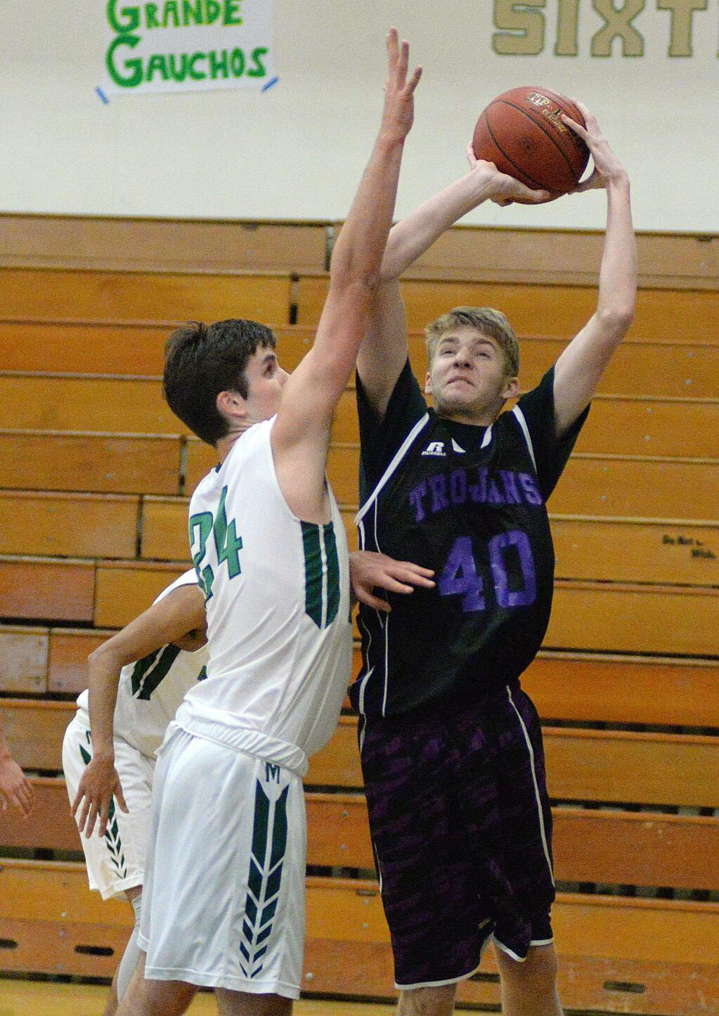 SUMNER FOWLER/FOR THE ARGUS-COURIERPetaluma High's Trojans are counting on continued strong play from Jack Anderson (40) as they begin Sonoma County League play Tuesday at Healdsburg.