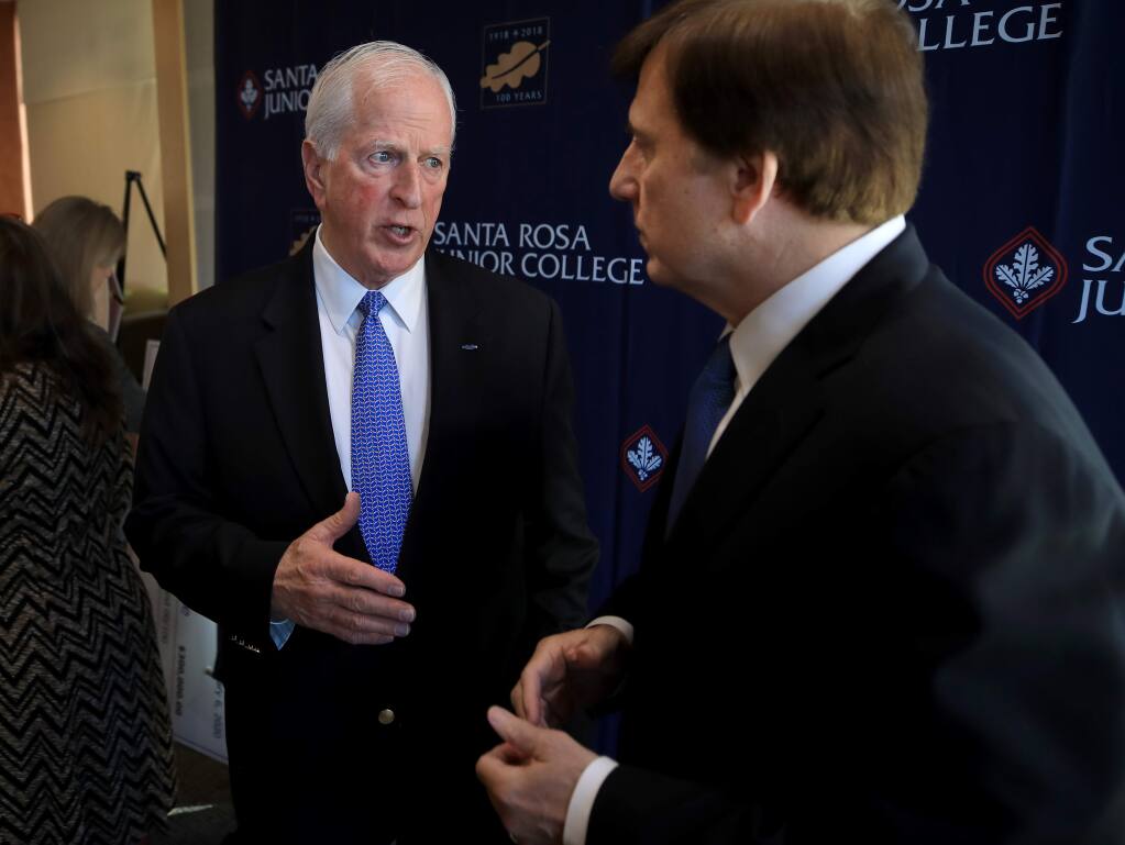Congressman Mike Thompson, left, talks with Secretary of Commerce John Fleming, after Fleming announced a $7.12 million grant by the US Economic Development Administration (EDA) disaster relief funds to help pay for the SRJC North Bay Regional Construction and Building Trades Employment Training Center, Monday, Jan. 6, 2020 in Santa Rosa. The facility will be built in Petaluma. (Kent Porter / The Press Democrat) 2020