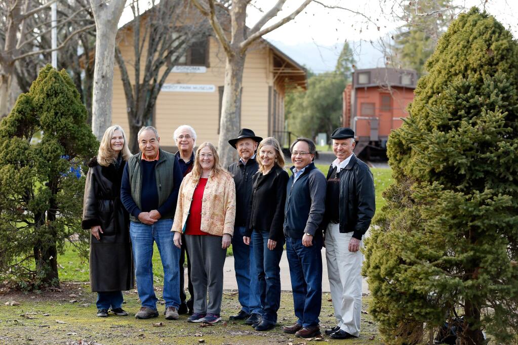 Members of the Sonoma Sister Cities Association's Sonoma-Penglai Committee pose for a portrait at Depot Park in Sonoma, California on Wednesday, January 25, 2017. The committee hopes to honor Chinese immigrants who labored in Sonoma County in the mid-1800's by constructing a Chinese-style pavilion at Depot Park. Committee members pictured from left to right: Marilyn Kravig, Dave Katz, Howard Eisenstark, Teresa Barnes, Gary Edwards, Peggy Phelan Rubens, Jack Ding, and Wayne Schake. (Alvin Jornada / The Press Democrat)