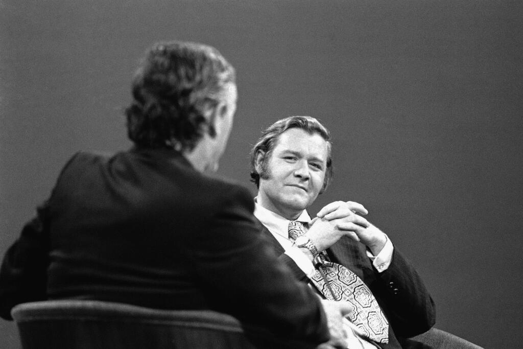 FILE – In this Dec. 7, 1971, file photo, Edgar H. Smith Jr., right, appears on a television show with columnist William F. Buckley Jr., left, in New York. Smith, a murder convict who got off New Jersey's death row with the help of Buckley only to later confess to the crime, died in a California prison hospital. Smith died March 20, 2017, a spokesman for the California Department of Correction and Rehabilitation told The Associated Press on Monday, Sept. 25, 2017. He was 83. (AP Photo/John Lent, File)
