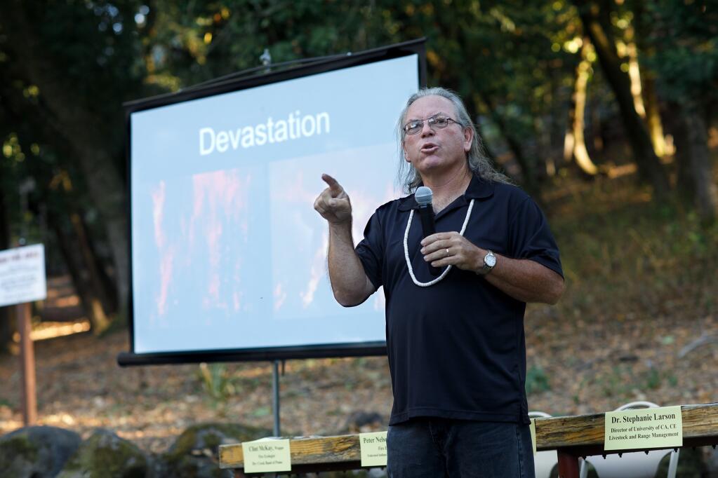 Clint McKay spoke to a crowd of 60 people at a panel about the benefits of tribal cultural burning on Wednesday, Aug. 4, 2021, at the Villa Chanticleer picnic area. (Paige Green)