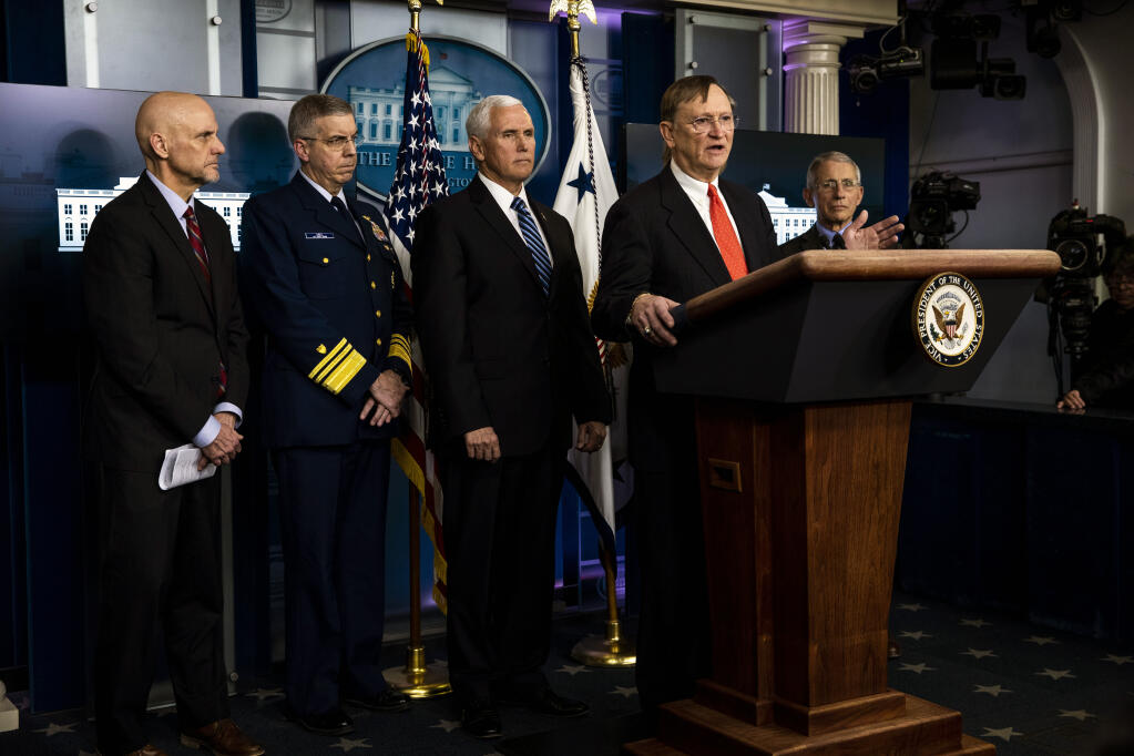 Dr. Robert Kadlec, who was with the Department of Health and Human Services under the Trump administration, is accompanied by members of the coronavirus task force as he speaks to reporters in Washington on March 6, 2020. The Emergent BioSolutions plant in Baltimore that recently had to scrap up to 15 million ruined doses of COVID-19 vaccine had flouted rules and downplayed errors, according to internal audits, ex-employees and clients. (Anna Moneymaker/The New York Times)
