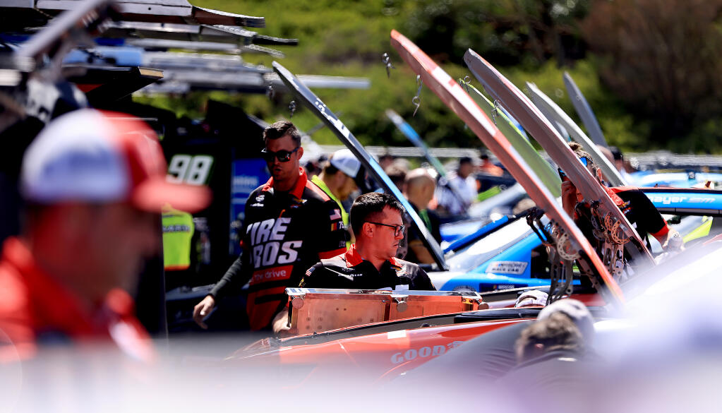 Xfinity Series stock cars are prepped for qualifying in the garage area, Friday, June 9, 2023 at Sonoma Raceway, a precursor to Saturday's Xfinity race.. (Kent Porter / The Press Democrat) 2023