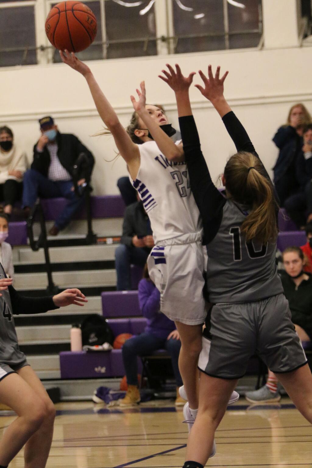 Petaluma’s Brooke Baxman puts up a shot in a game against West County. Baxman scored nine points, but West County won the game. (DWIGHT SUGIOKA / FOR THE ARGUS-COURIER)