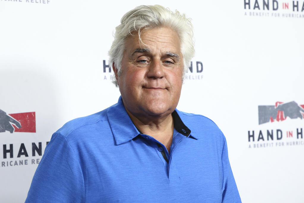 FILE - Jay Leno attends the Hand in Hand: A Benefit for Hurricane Harvey Relief in Los Angeles on Sept. 12, 2017. The comedian and former “Tonight Show” host told a Las Vegas Review-Journal columnist Thursday that he broke his collarbone and two ribs and cracked his kneecaps on Jan. 17. (Photo by John Salangsang/Invision/AP, File)
