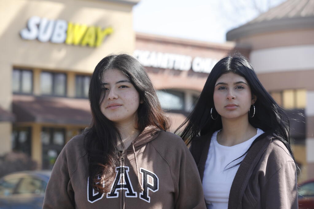 San Antonio High School students Lorenza Tapia, 16, left, and Alessandra Chavez, 16, stand outside the Subway sandwich shop at the intersection of Lakeville Street and Caufield Lane in Petaluma, Wednesday, March 15, 2023. (Beth Schlanker / The Press Democrat file)