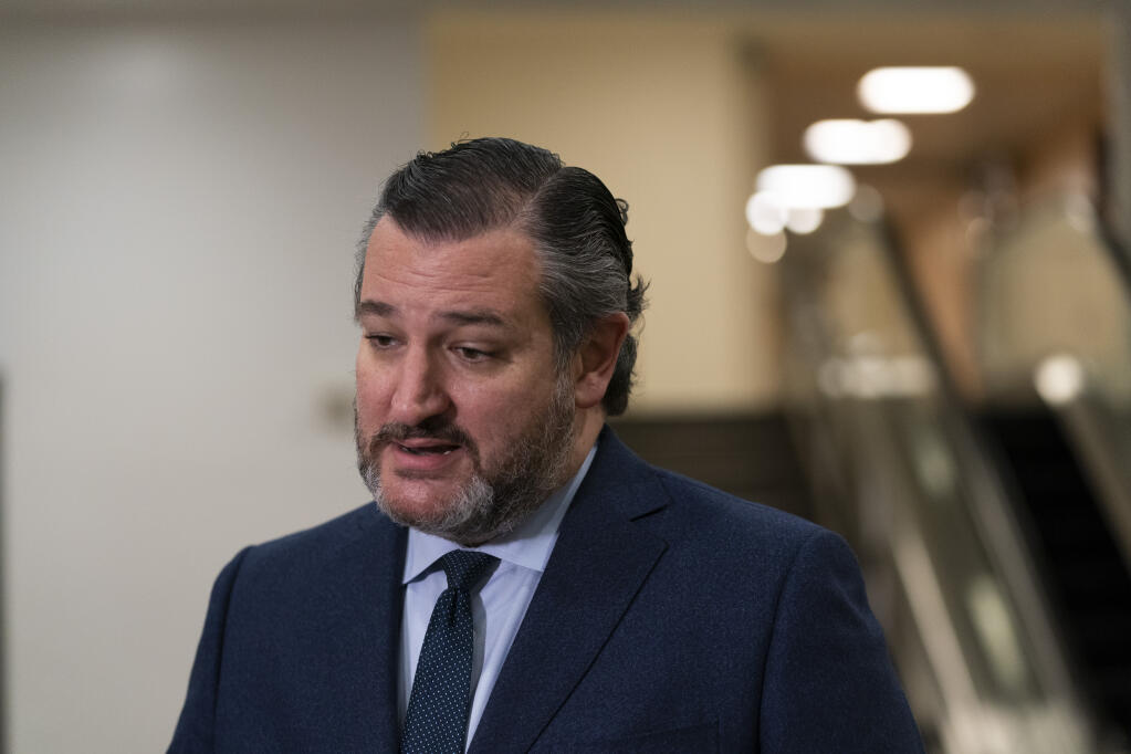 Sen. Ted Cruz, R-Texas, speaks with reporters on Capitol Hill in Washington, Saturday, Feb. 13, 2021, on the fifth day of the second impeachment trial of former President Donald Trump. (AP Photo/Alex Brandon)