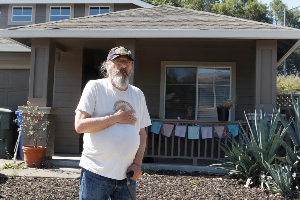 Ken Brown stands in front of the house he’s rented for more than 10 years. The owner has decided to take it off the rental market and is evicting Brown and his 19-year-old daughter. (Bill Hoban/Special to the Index-Tribune)