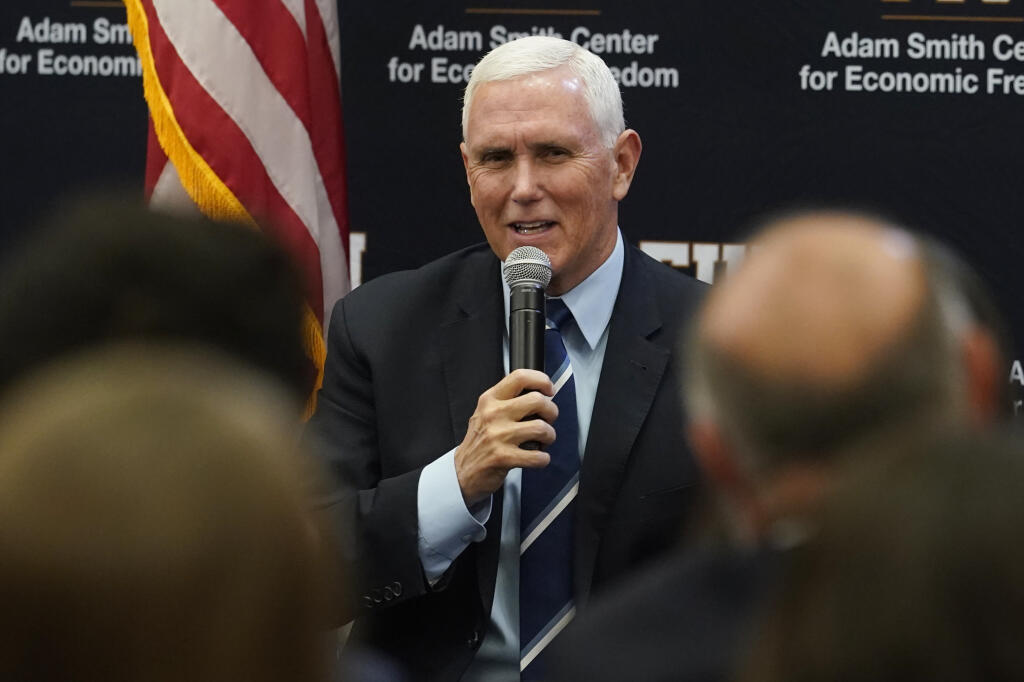 Former Vice President Mike Pence said he takes "full responsibility" after classified documents were found at his Indiana home while speaking at Florida International University, Friday, Jan. 27, 2023, in Miami. Pence was talking about the economy and promoting his new book, "So Help Me God." (AP Photo/Marta Lavandier)