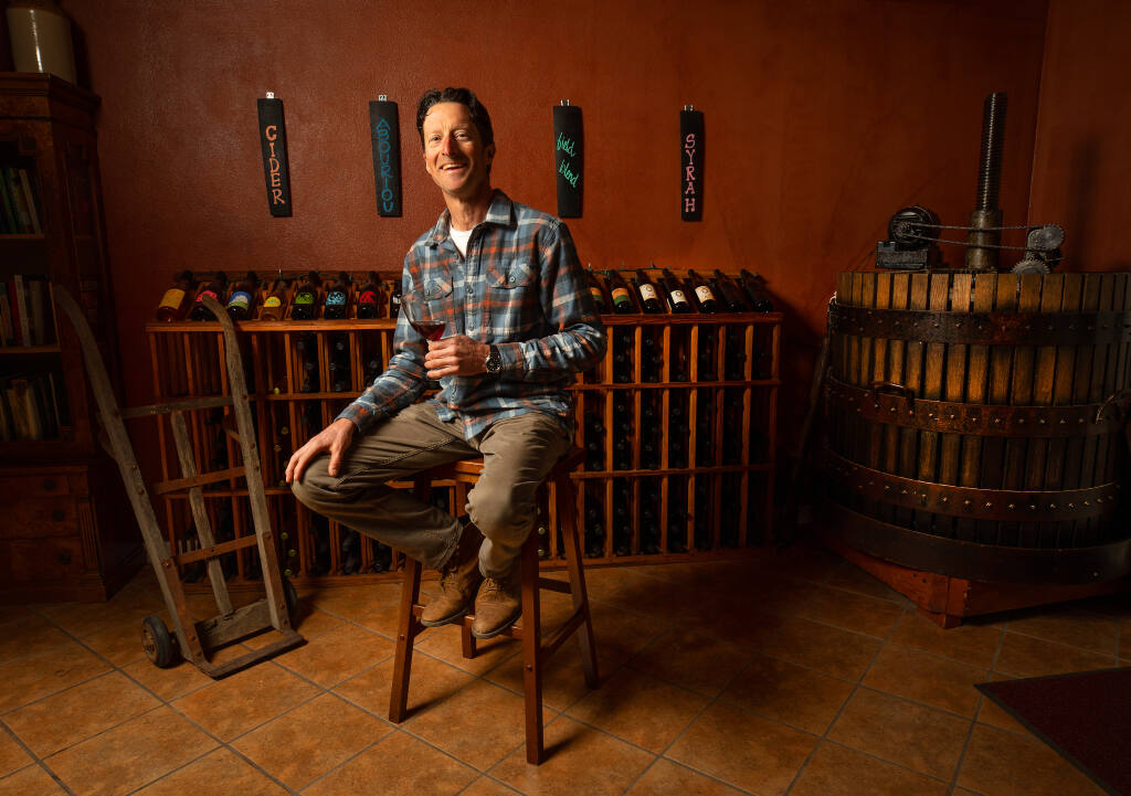 Derek Trowbridge, winemaker/owner of Old World Winery produces his natural blend “Bloom” wine, Thursday, Feb. 16, 2023.  (John Burgess / The Press Democrat)