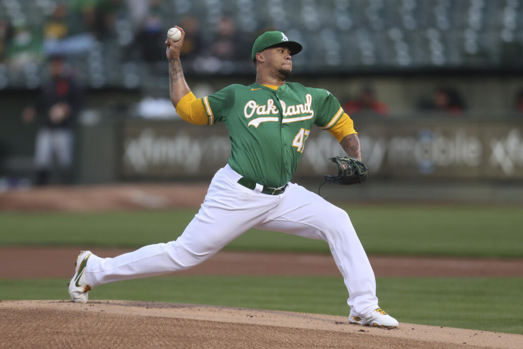 Oakland Athletics pitcher Frankie Montas throws to a Detroit Tigers batter during the first inning in Oakland on Friday, April 16, 2021. (Jed Jacobsohn / ASSOCIATED PRESS)