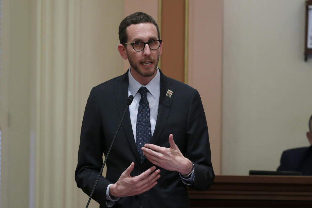 FILE — In this Jan 21, 2020 file photo Democratic state Sen. Scott Wiener speaks during the Senate session at the Capitol in Sacramento, Calif. On Friday, Sept. 10, 2021, lawmakers approved Wiener's bill that would stop police in California from arresting anyone for loitering with the intent to engage in prostitution. (AP Photo/Rich Pedroncelli, File)