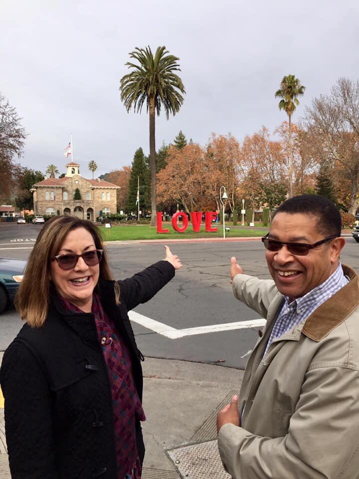 Connie and Maurice Parker salute the ’Love’ sculpture installed on the Sonoma Plaza in 2018.