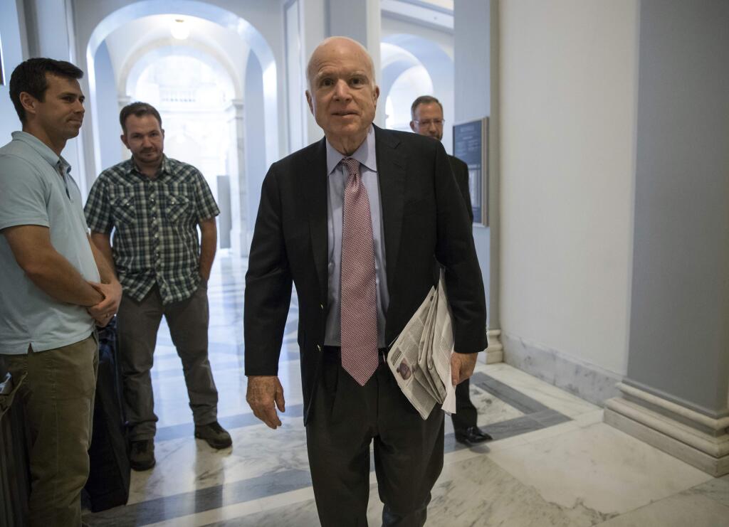 Sen. John McCain, R-Arizona, arrives Monday at his office in Washington. (J. SCOTT APPLEWHITE / Associated Press)