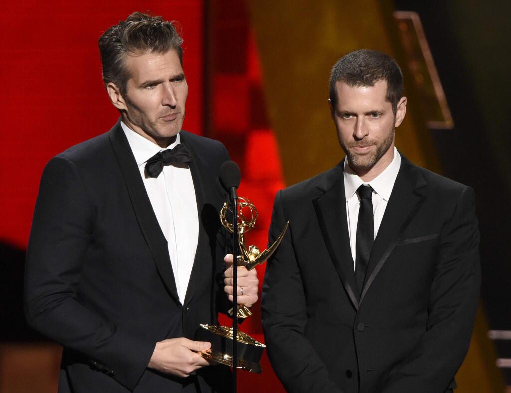 FILE - In this Sept. 20, 2015 file photo, creator-showrunners David Benioff, left, and D.B. Weiss accept the award for outstanding writing for a drama series for 'Game Of Thrones' at the 67th Primetime Emmy Awards in Los Angeles. HBO's announcement, Wednesday, July 19, 2017, that Benioff and Weiss will follow 'Game of Thrones' with an HBO series in which slavery remains legal in the modern-day South drew fire on social media from those who fear that a pair of white producers are unfit to tell that story and that telling it will glorify racism. The series, “Confederate,” will take place in an alternate timeline where the southern states have successfully seceded from the Union and formed a nation in which legalized slavery has evolved into a modern institution. (Photo by Chris Pizzello/Invision/AP, File)