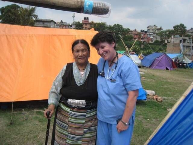 Courtesy of Donna TullyDonna Tully in Nepal / Tibetan Buddhist displaced persons tent encampment, June 19, 2015, with IMR