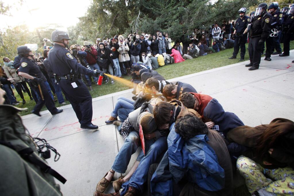 UC Davis spent $175,000 to scrub the Internet for negative references stemming from a 2011 incidence in which campus police officers pepper-sprayed nonviolent protesters. (WAYNE TILCOCK / Davis Enterprise)