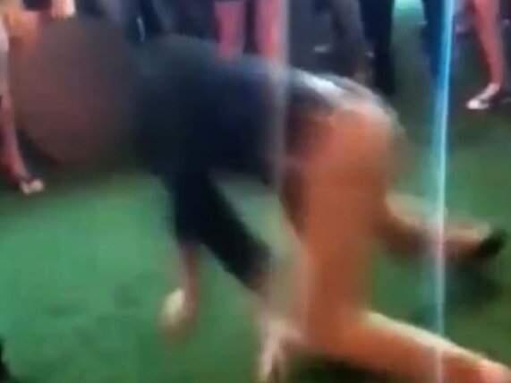 A screen grab from the video showing the man dancing at a Denver club.