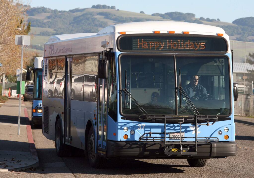 An old-fashioned Petaluma Transit bus pulls out of the Eastside Transit Center in 2014. (SCOTT MANCHESTER/ARGUS-COURIER STAFF)
