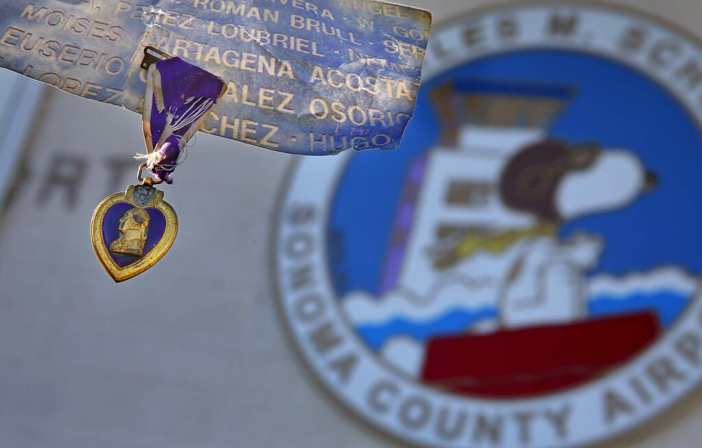 A Purple Heart earned by Miguel A. Perez Loubriel during the Korean War was found near the baggage claim area at the Charles M. Schulz-Sonoma County Airport, in Santa Rosa. The medal is being kept in a safe, while airport personnel attempt to locate the current owner.(Christopher Chung/ The Press Democrat)