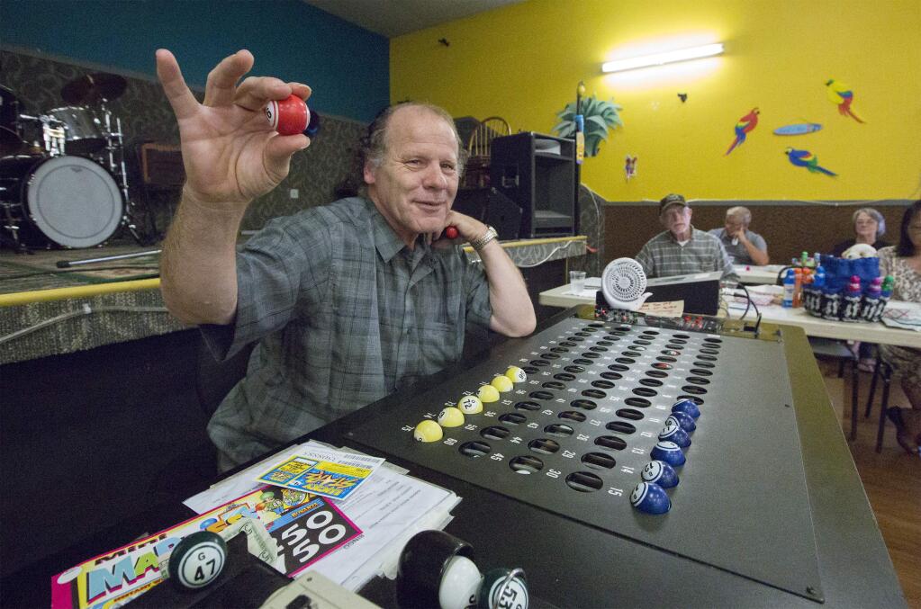 Charles Dyer is the first bingo numbers caller of the evening at the Sonoma Moose Lodge on Broadway, on Tuesday, Sept. 3. (Photo by Robbi Pengelly/Index-Tribune)