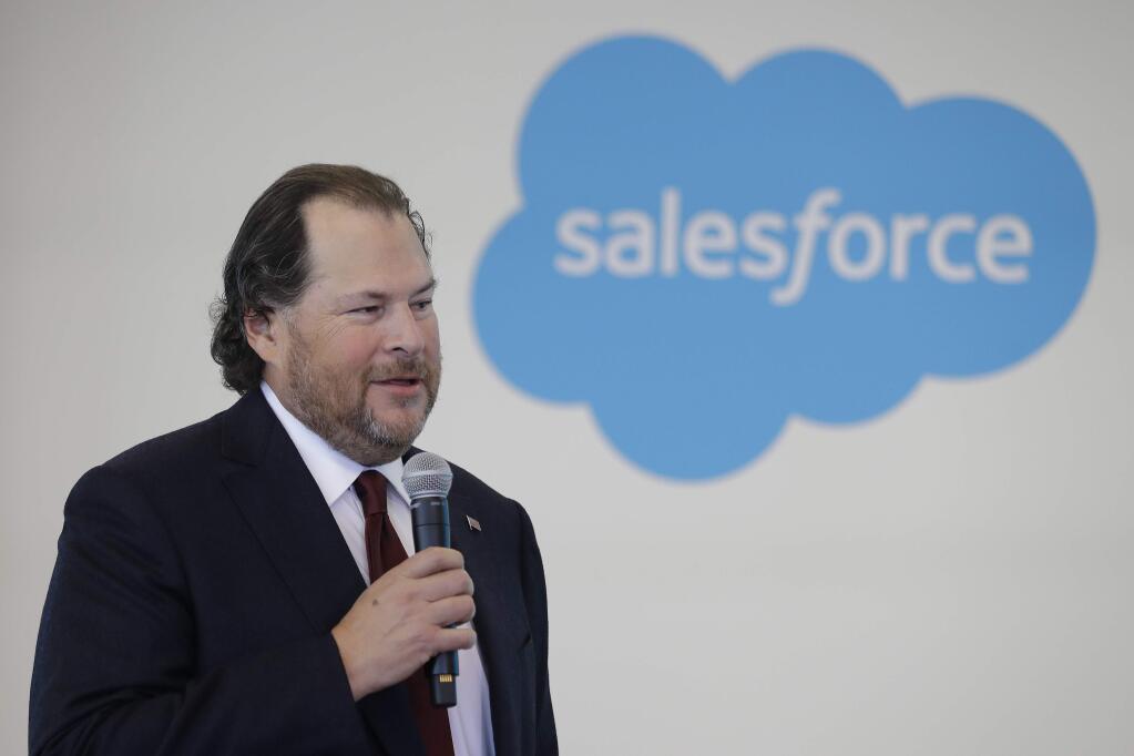 FILE - In this May 16, 2019 file photo, Salesforce chairman Marc Benioff speaks during a news conference, in Indianapolis. Salesforce is buying Tableau Software in an all-stock deal valued at $15.7 billion. The buyout is expected to close during Salesforce's fiscal 3rd quarter. (AP Photo/Darron Cummings, File)