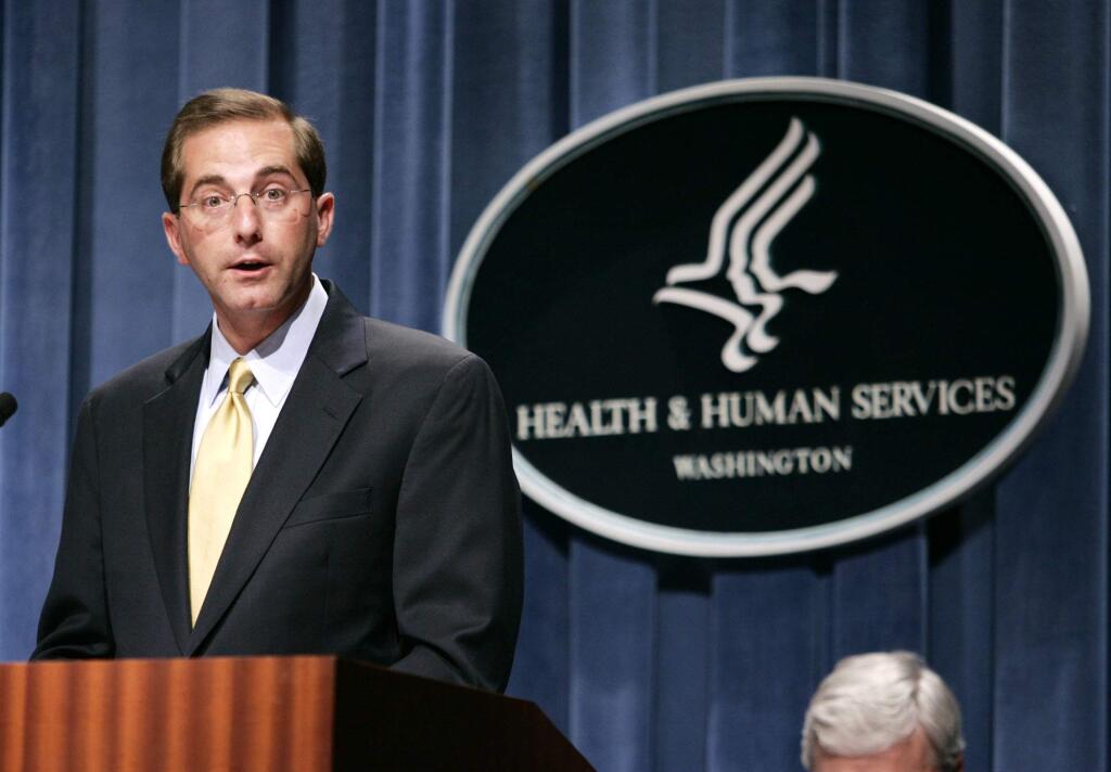 FILE - In this June 8, 2006 file photo, then Deputy Health and Human Services Secretary Alex Azar meets reporters at the HHS Department in Washington. Azar was a top HHS official during the George W. Bush administration. (AP Photo/Evan Vucci)