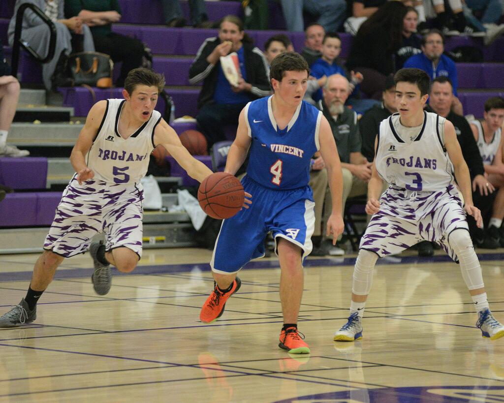 SUMNER FOWLER/FOR THE ARGUS-COURIERPetaluma is building a new backcourt around point guard Benny Spaletta (5) and sophomore Robbie Isetta (3).